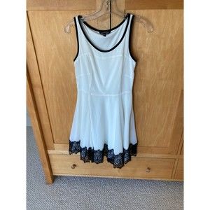 Express white sleeveless dress with black lace trim size 2. 34" long. washable